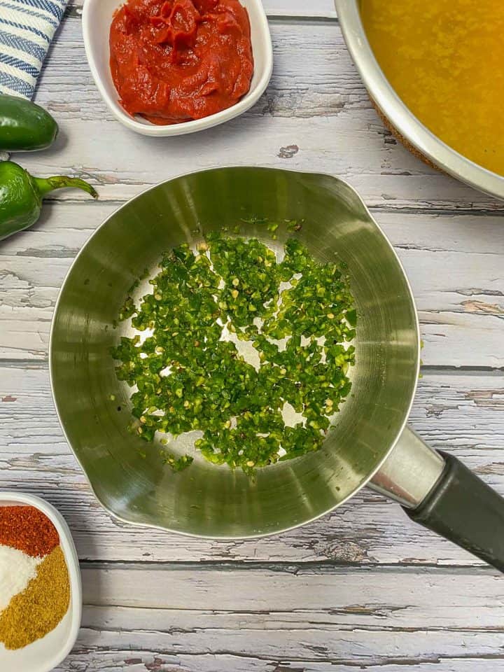 finely chopped jalapenos in small sauce pot