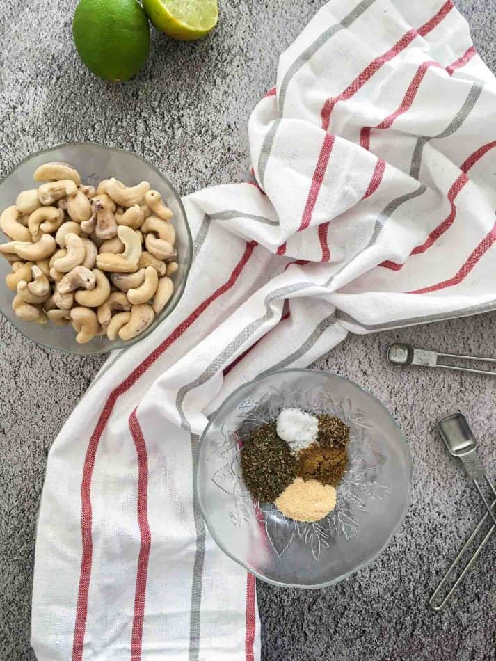 bowl of cashews and bowl of spices