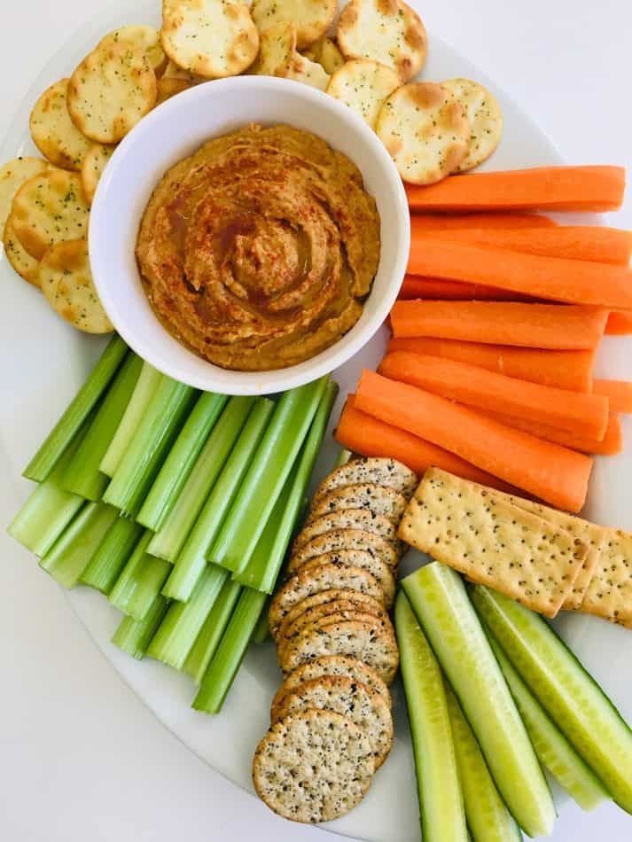 peanut butter humms with veggies and crackers tray