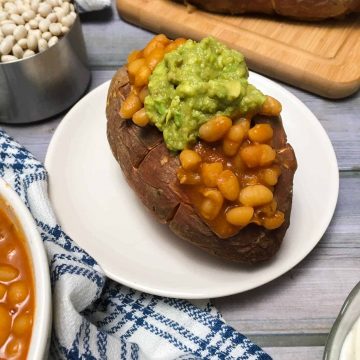 sweet potato stuffed with baked beans and guacamole