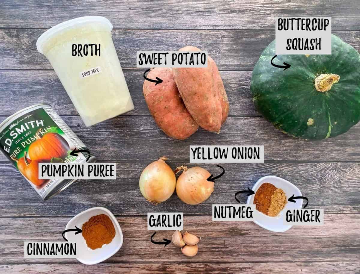 Ingredients to make pumpkin sweet potato soup on grey deck.