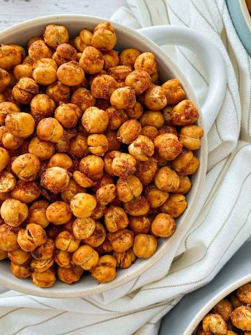 white bowl filled with air fried chickpeas.