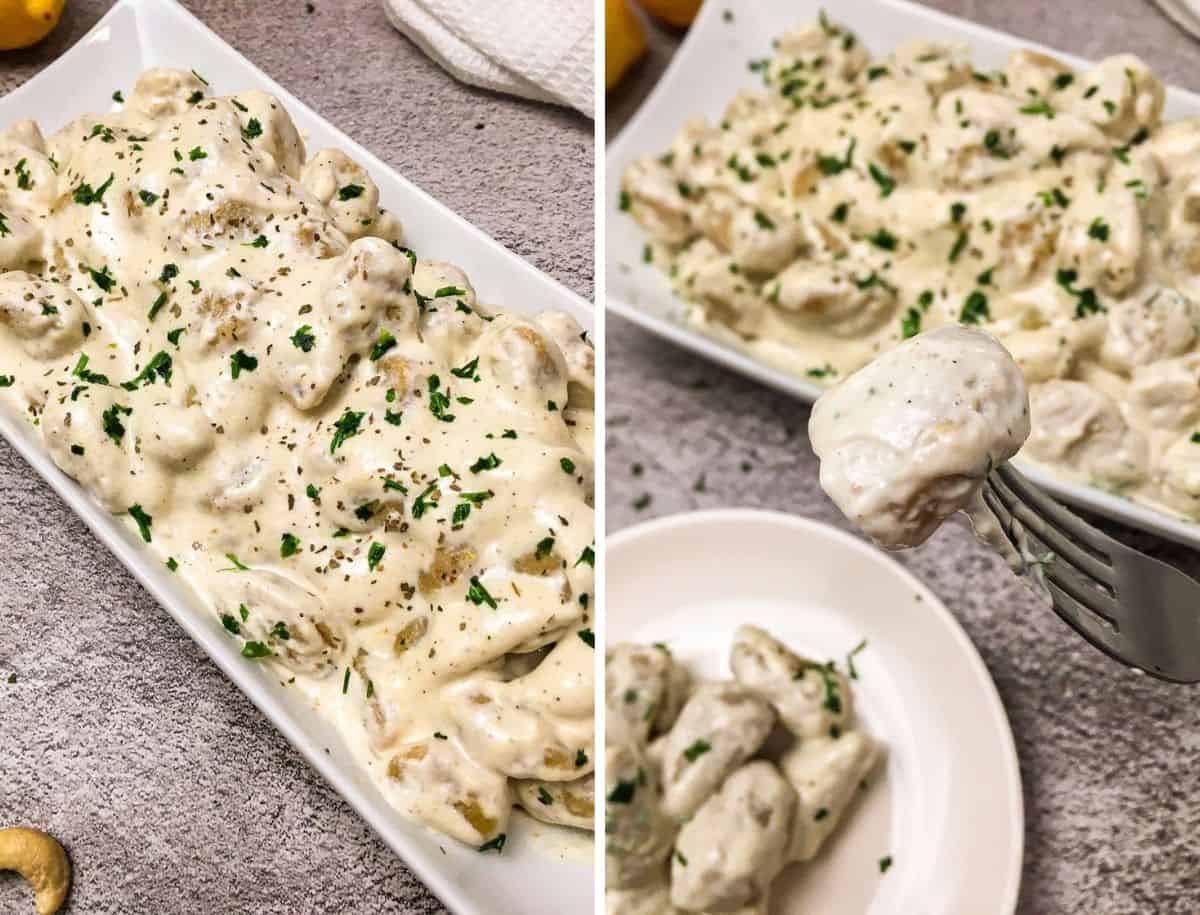 Gnocchi with alfredo sauce in white serving dish.
