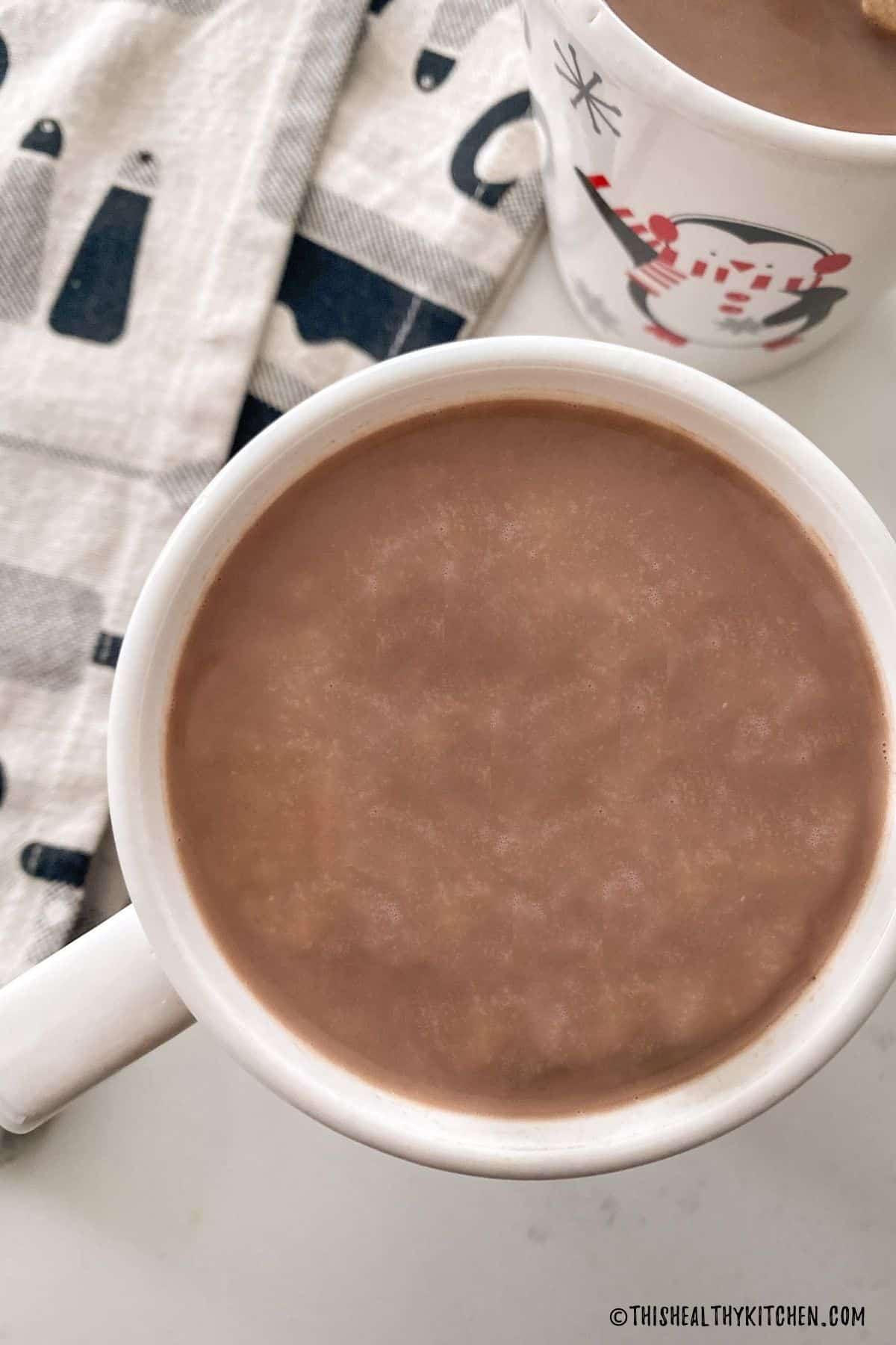 Hot chocolate in white mug.