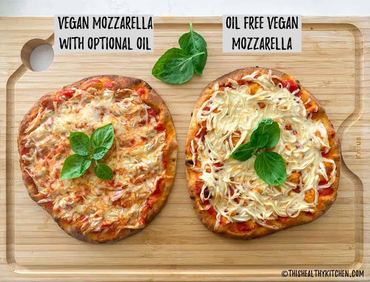 Two flatbread pizzas side by side on cutting board with vegan mozzarella on top after baking.