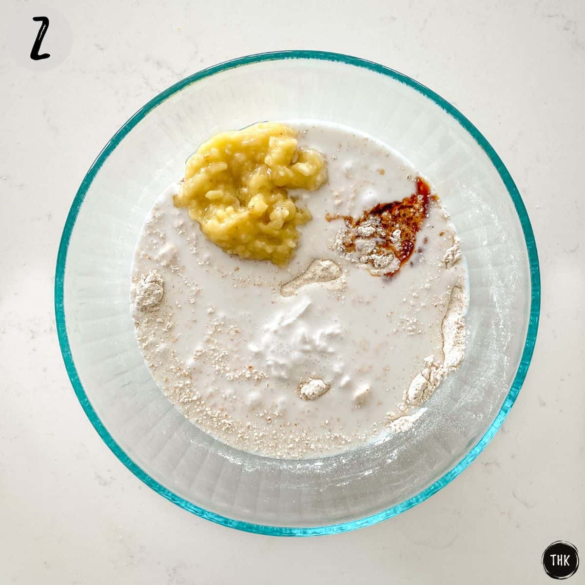 Flour, milk, banana and vanilla in large bowl.