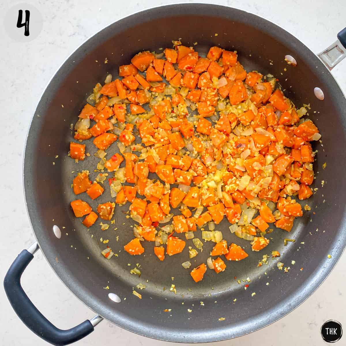 Sautéed carrot, onion and garlic in large skillet.
