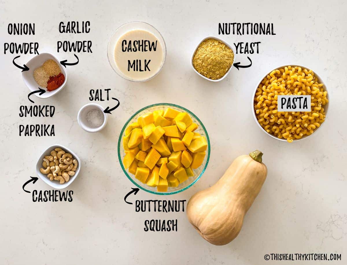 Ingredients needed to make butternut squash mac and cheese on kitchen countertop.