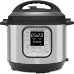 Image of Instant Pot pressure cooker on white background.