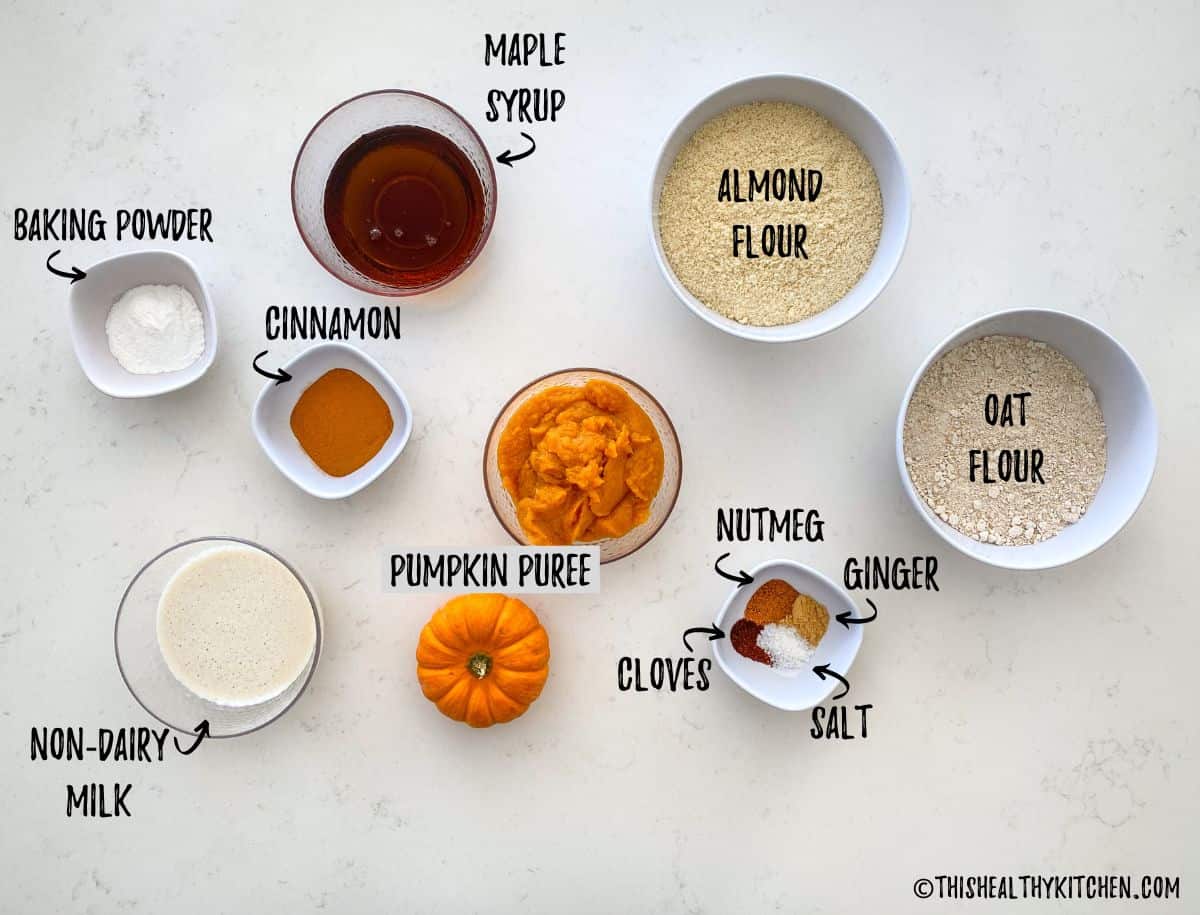 Ingredients needed to make vegan pumpkin cupcakes in prep bowls.