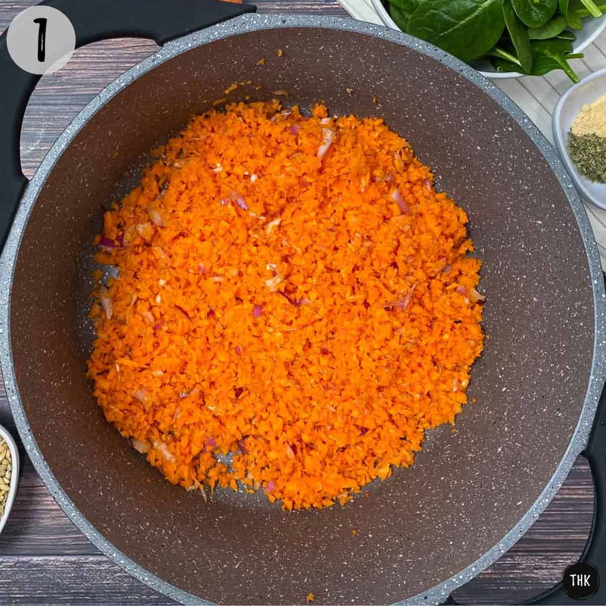 Pot with finely chopped carrots and onion inside.