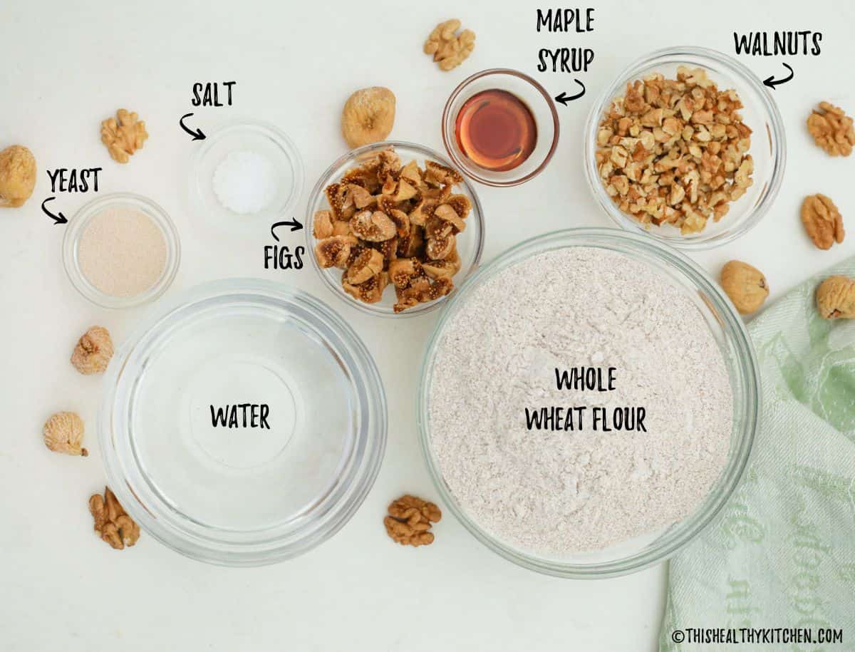 Ingredients needed to make fig and walnut bread on counter.