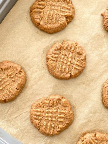 Close up of cooked walnut butter cookies.