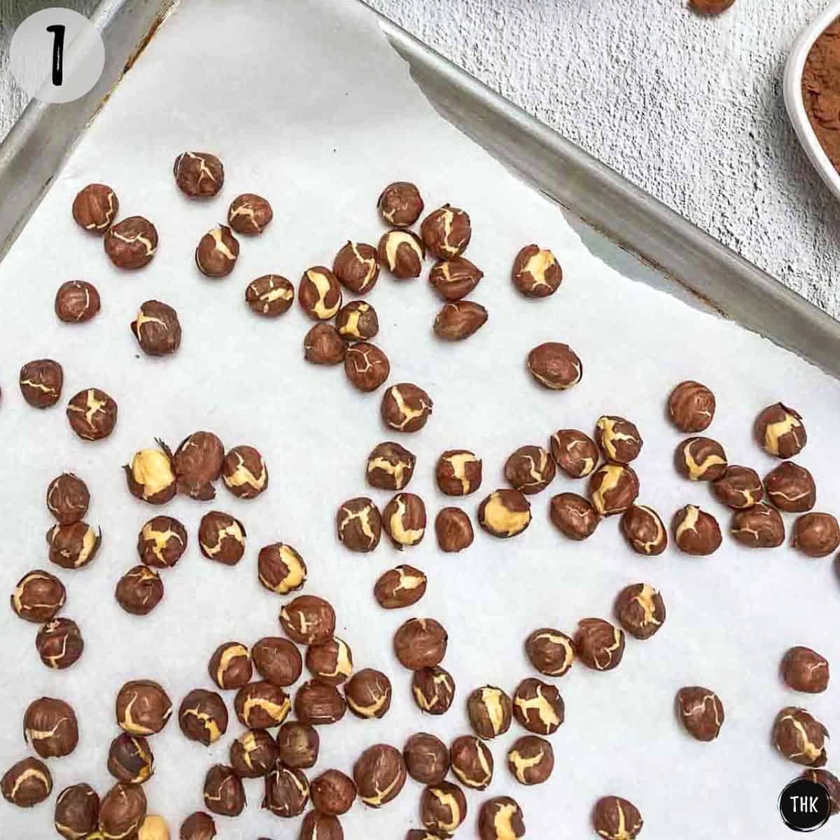 Hazelnuts on baking tray.