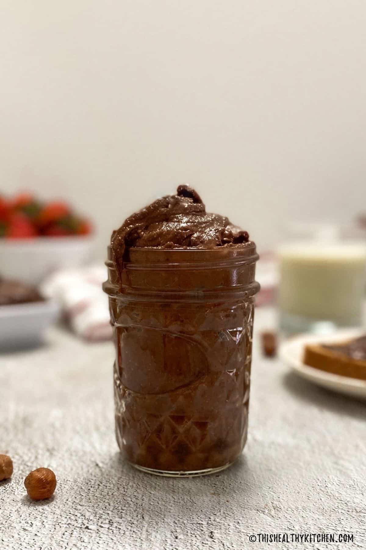 Glass jar filled with homemade nutella.