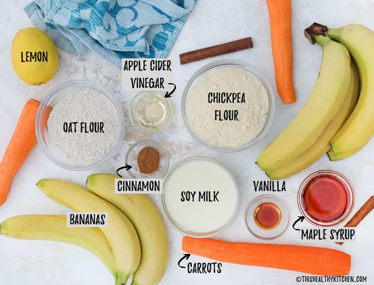 Ingredients needed to make banana carrot muffins on counter top.