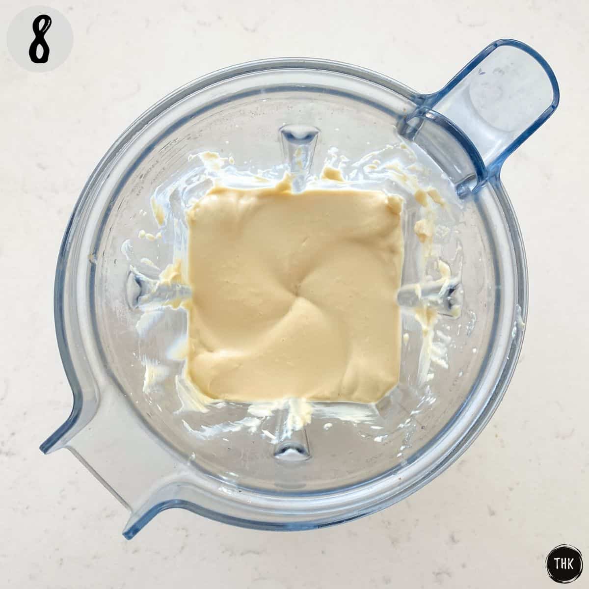 Vegan cream cheese frosting inside blender.