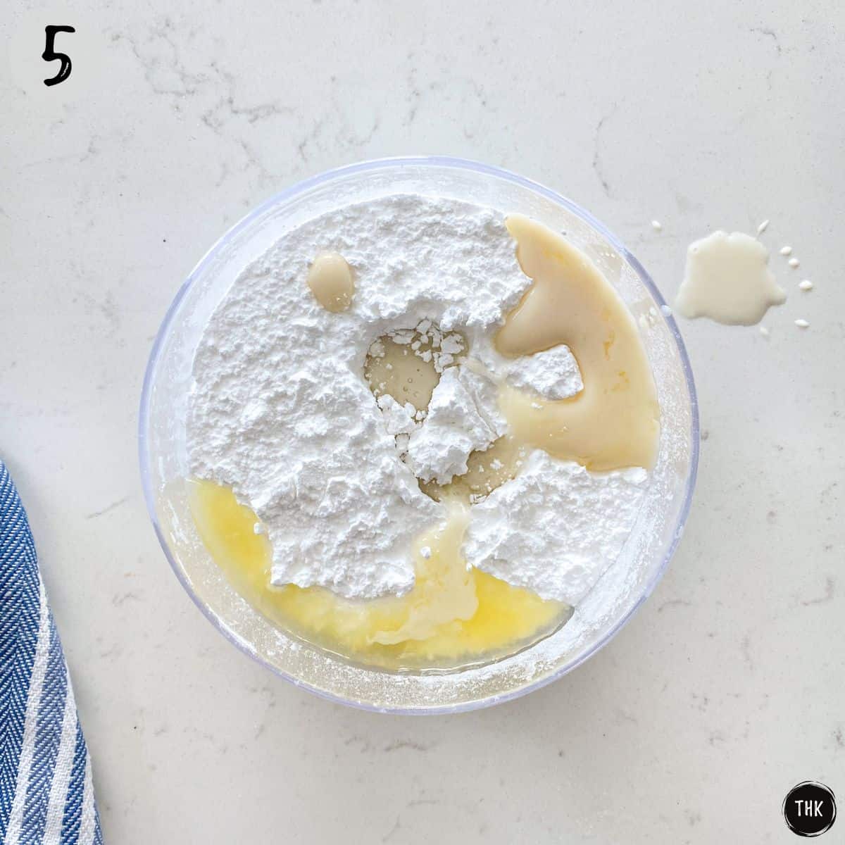 Bowl of sugar, lemon juice and milk to make glaze.