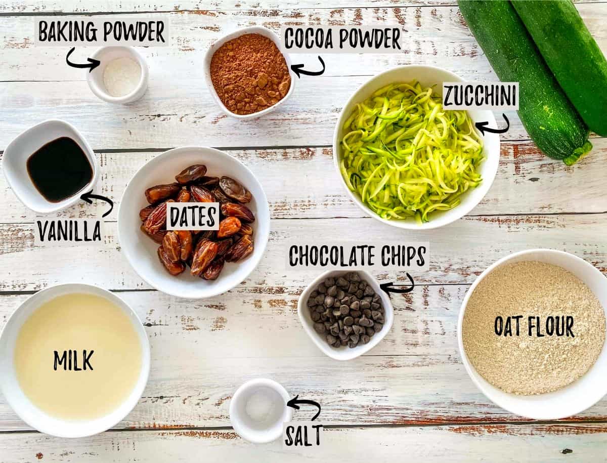 Ingredients needed to make vegan chocolate zucchini bread in prep bowls.