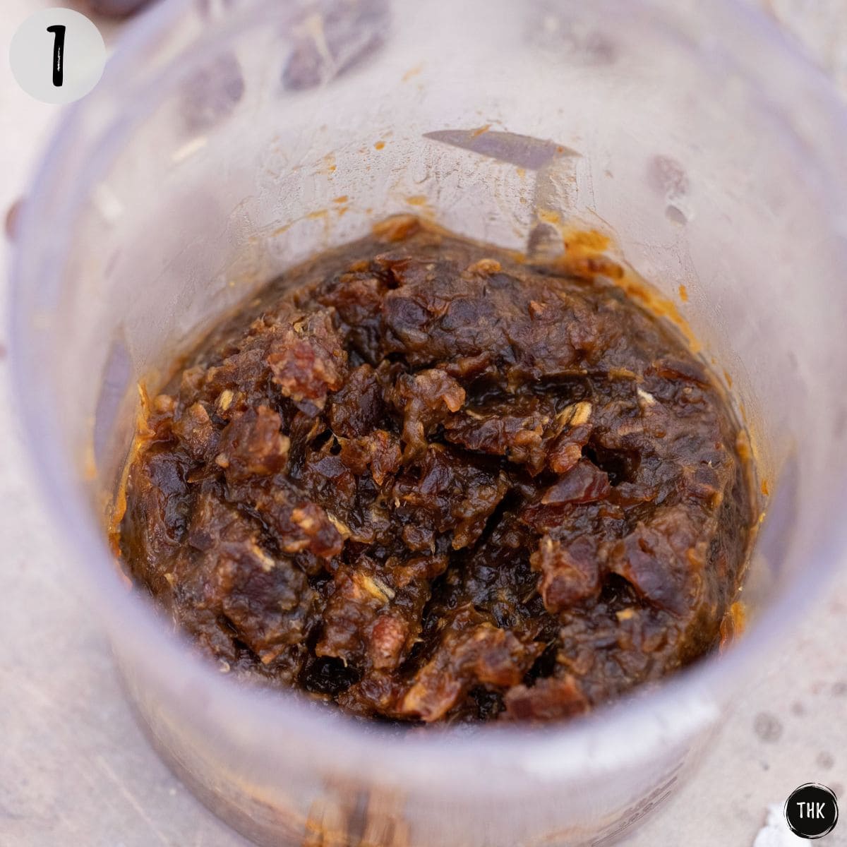 Dates and water inside food processor.