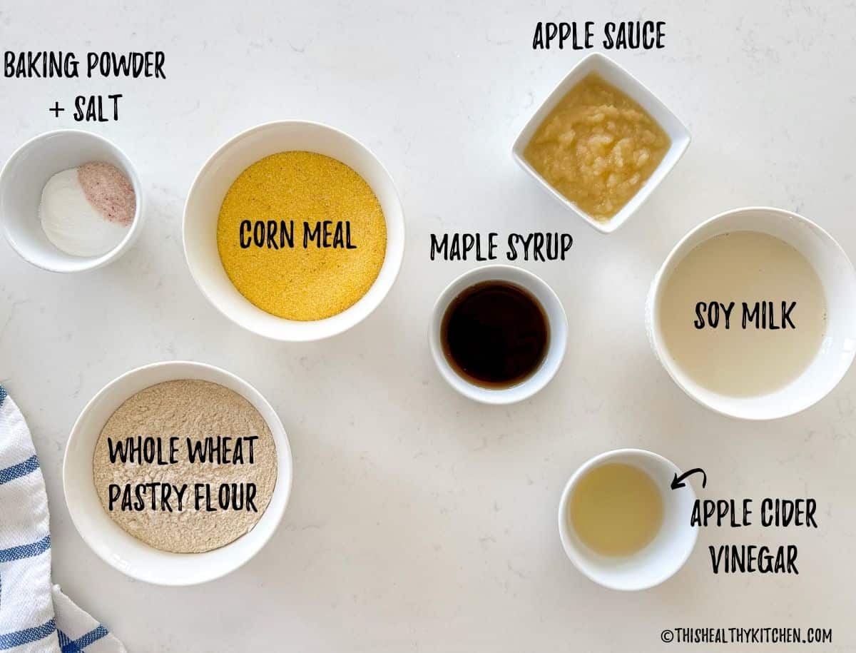 Ingredients needed to make oil free vegan cornbread in prep bowls on countertop.