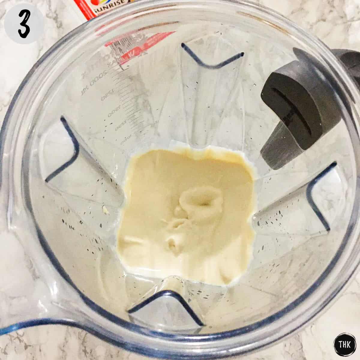 Blended tofu inside blender.