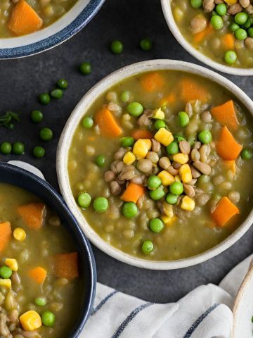 Lentil split pea soup in four bowls.