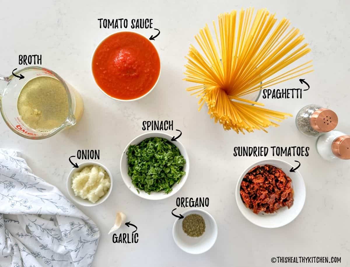 Ingredients to make baked spaghetti on countertop.