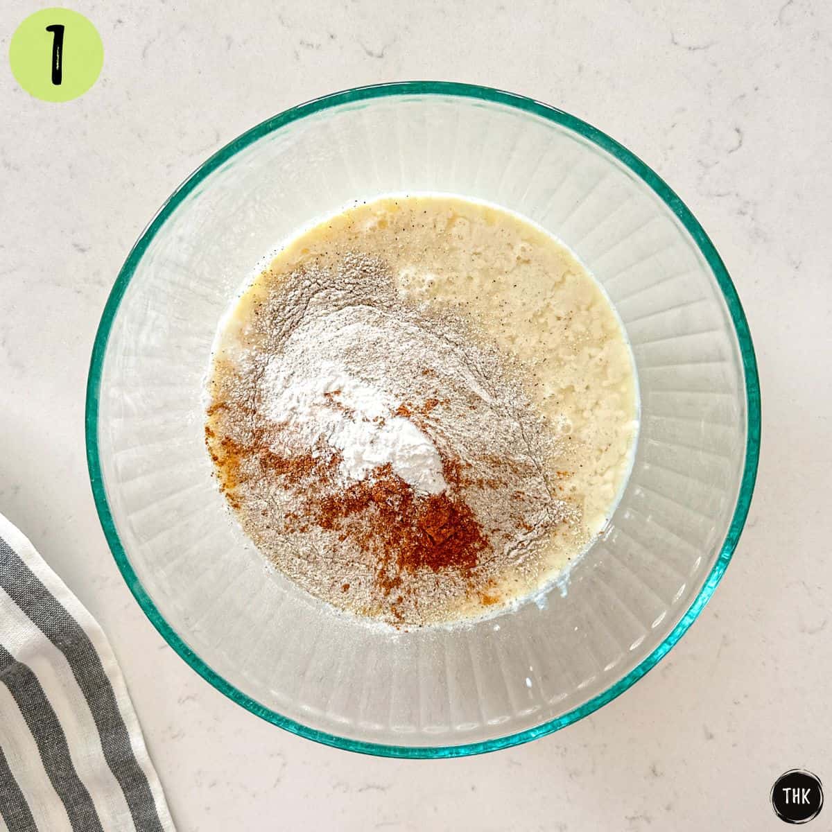 Milk, flour, baking powder, and cinnamon in large mixing bowl.