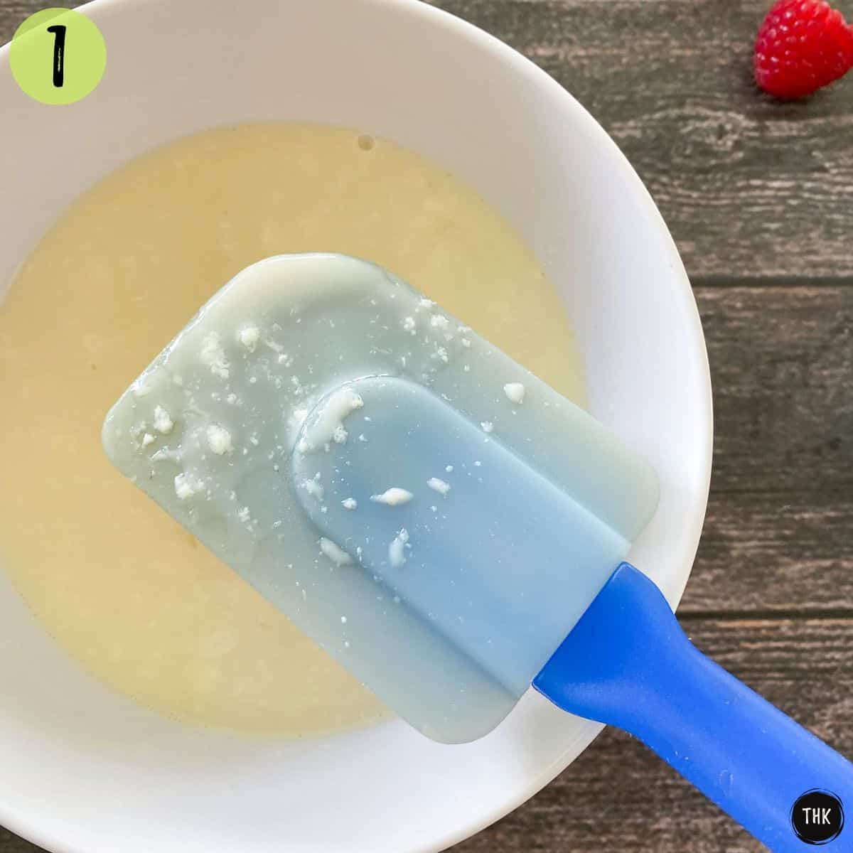 White bowl of curdled soy milk.