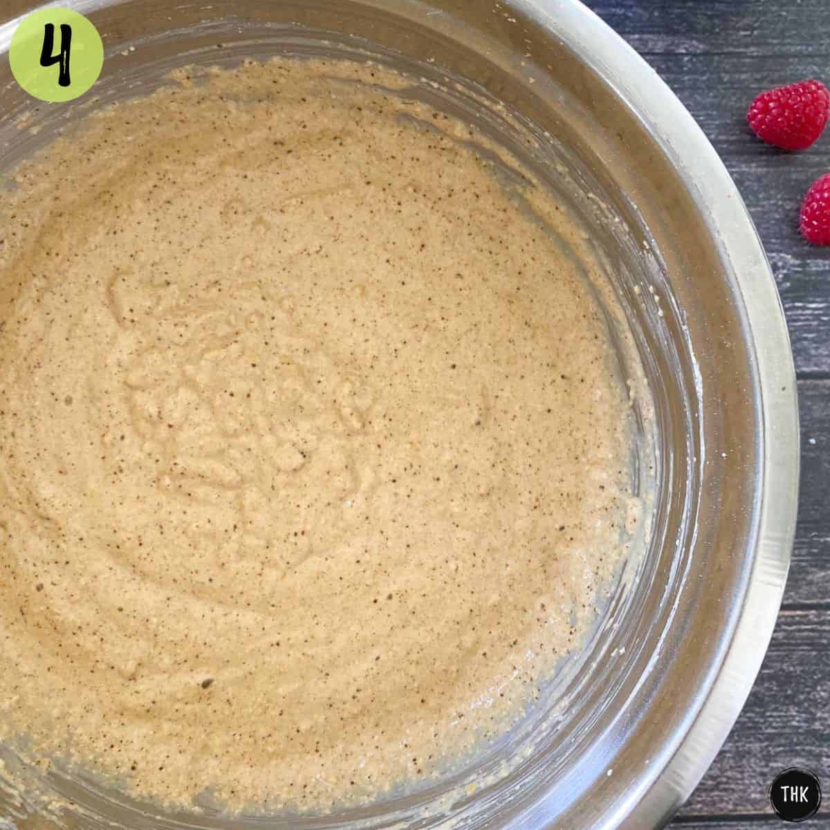 Muffin batter inside large mixing bowl.