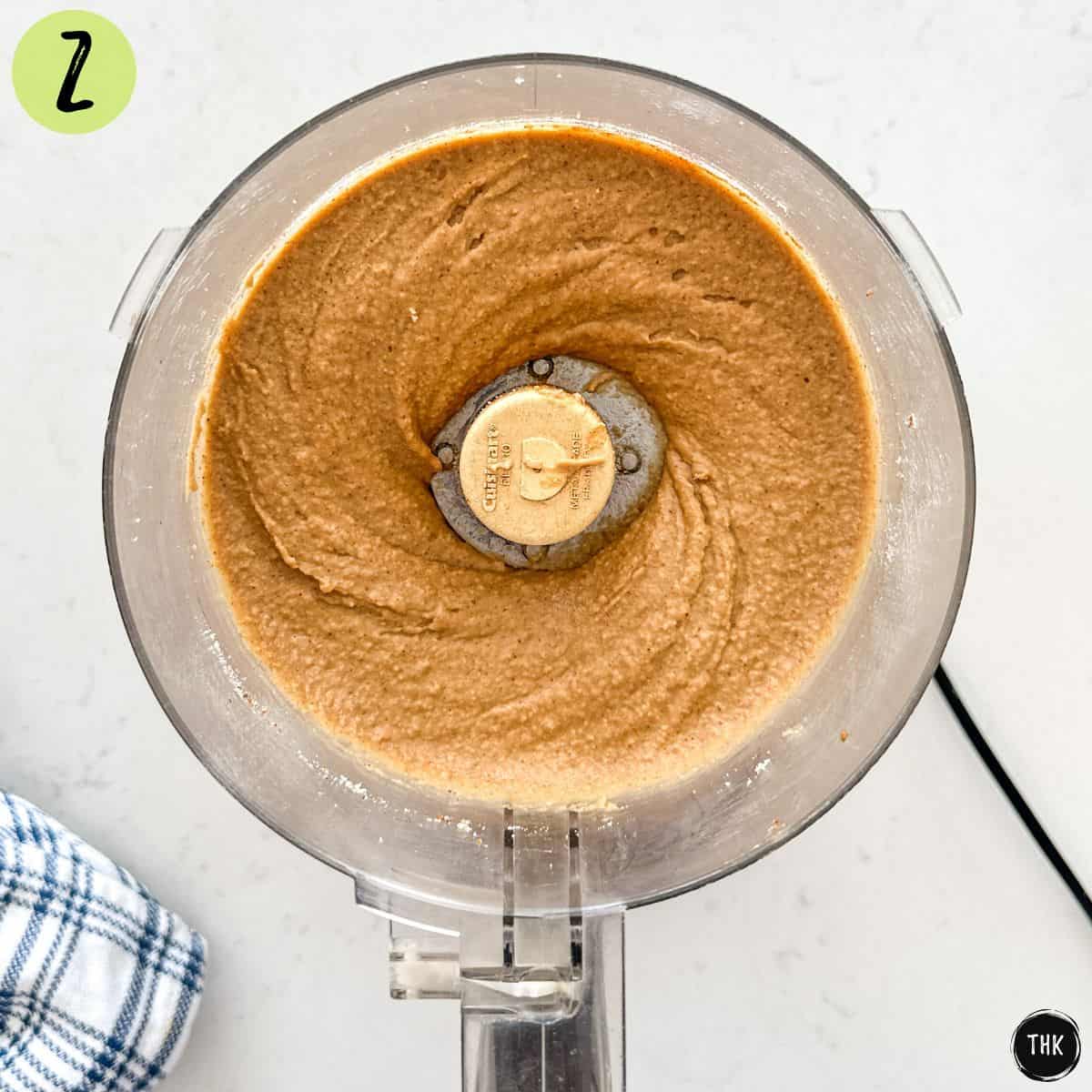 Blended blondie mixture inside food processor.