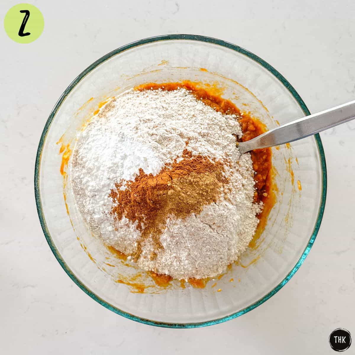 Flour, spiced and baking powder in mixing bowl.