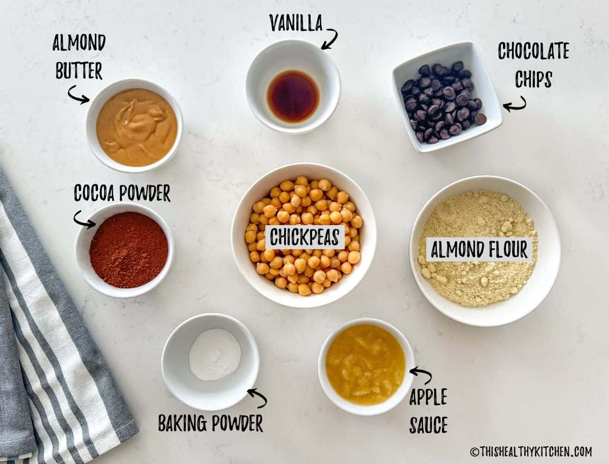 Bowls of ingredients needed to make chocolate chickpea cookies.