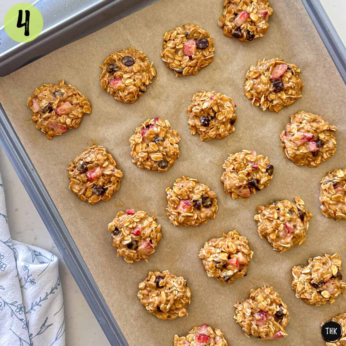 Oatmeal strawberry cookies on baking sheet before baking.