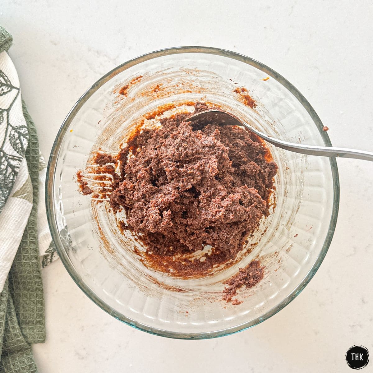 Chocolate pumpkin batter in large glass bowl.